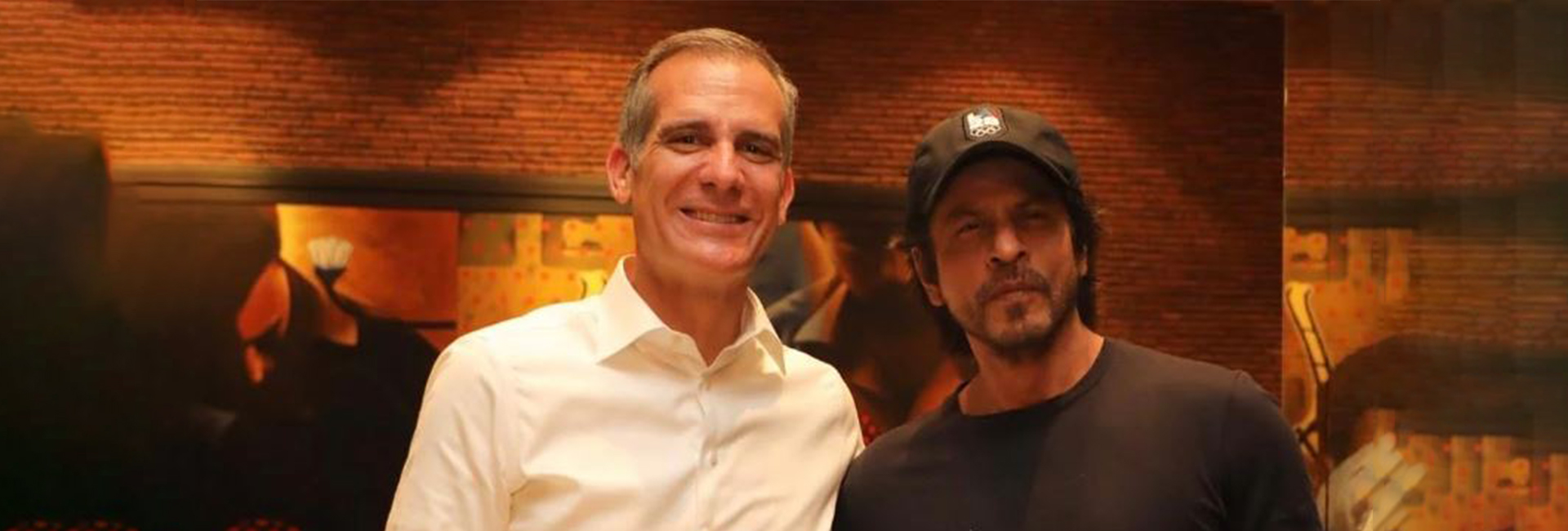 US Ambassador to India Eric Garcetti visited Shah Rukh Khan at his Mumbai home Mannat. Sharing the photos, he tweeted, "Is it time for my Bollywood debut? Had a wonderful chat with superstar @iamsrk at his residence Mannat, learning more about the film industry in Mumbai and discussing the huge cultural impact of Hollywood and Bollywood across the globe.