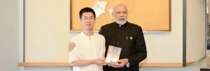 Professor Wang Zhicheng With Narendta Modi Banner 1